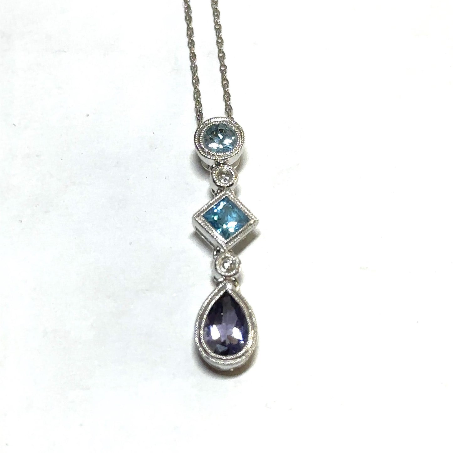 White Gold Amethyst and Topaz Pendant